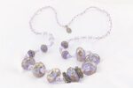 Heffalump lavender violet colored glass bead necklace with sterling silver overlay.