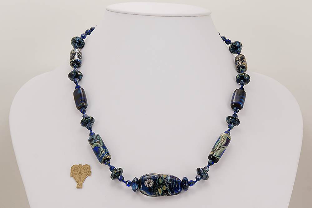 Cobalt blue and green colored glass bead necklace with sterling silver accents,
