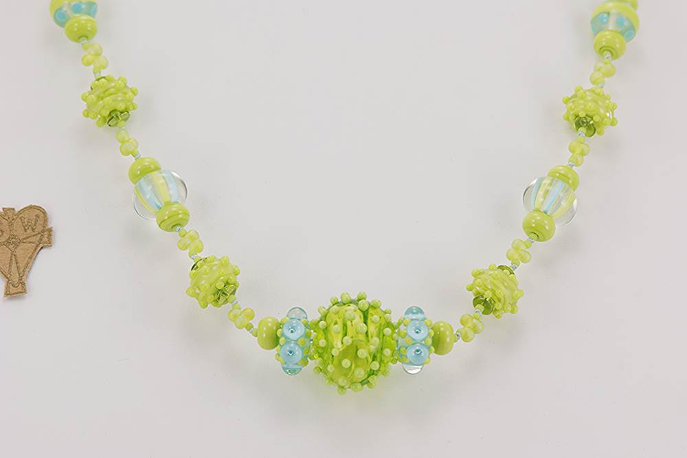 Handmade , spring green and teal colored glass bead necklace.