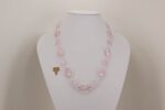 pink glass beaded necklace with quartz crystal and sterling silver