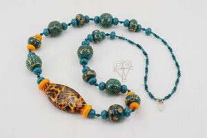 Orange and teal colored glass bead necklace.
