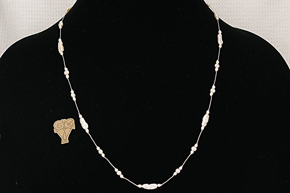 One of a kind, freshwater, baroque, stick pearl necklace.