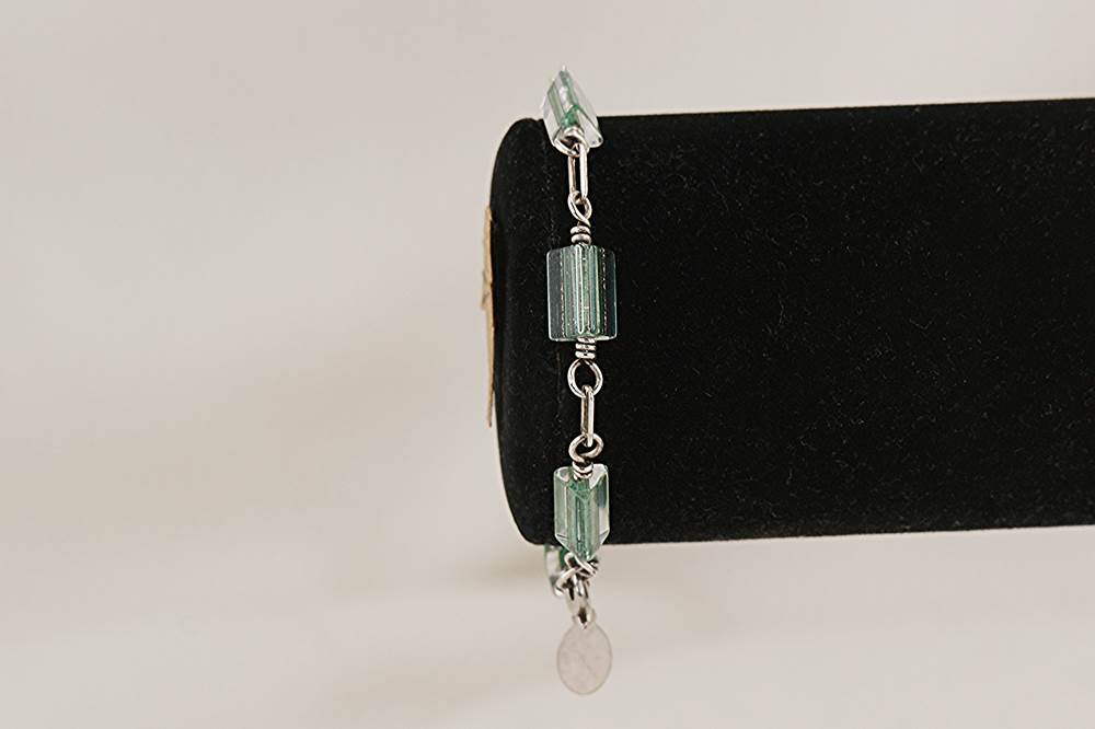 One of a kind, ceylon green, triangular, glass bead bracelet with sterling silver.