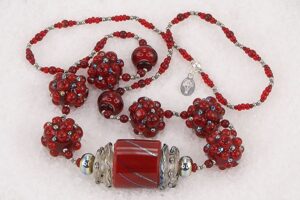 One of a kind red and sterling silver glass bead necklace.