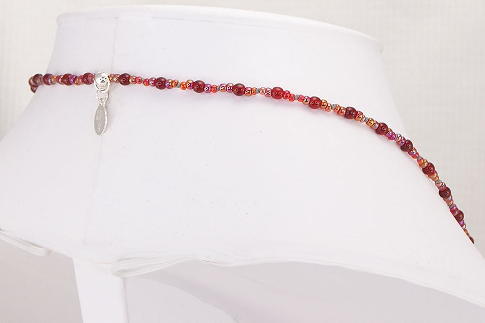 Stunning necklace made of vintage Venetian and dichroic red glass beads