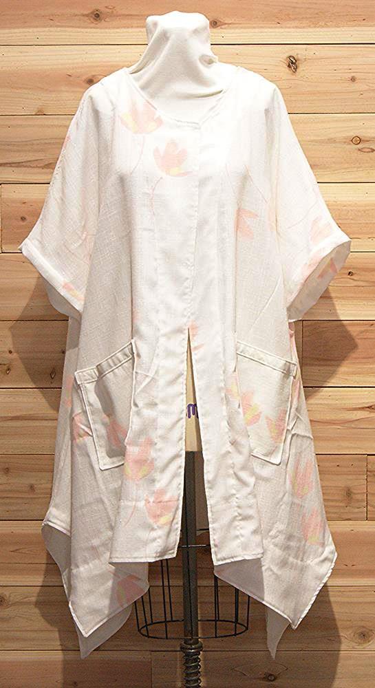 White, %100 Italian linen chic cloak with pink/ peach tulip like flowered print and front pockets.