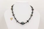 black glass beaded necklace with sterling silver edging