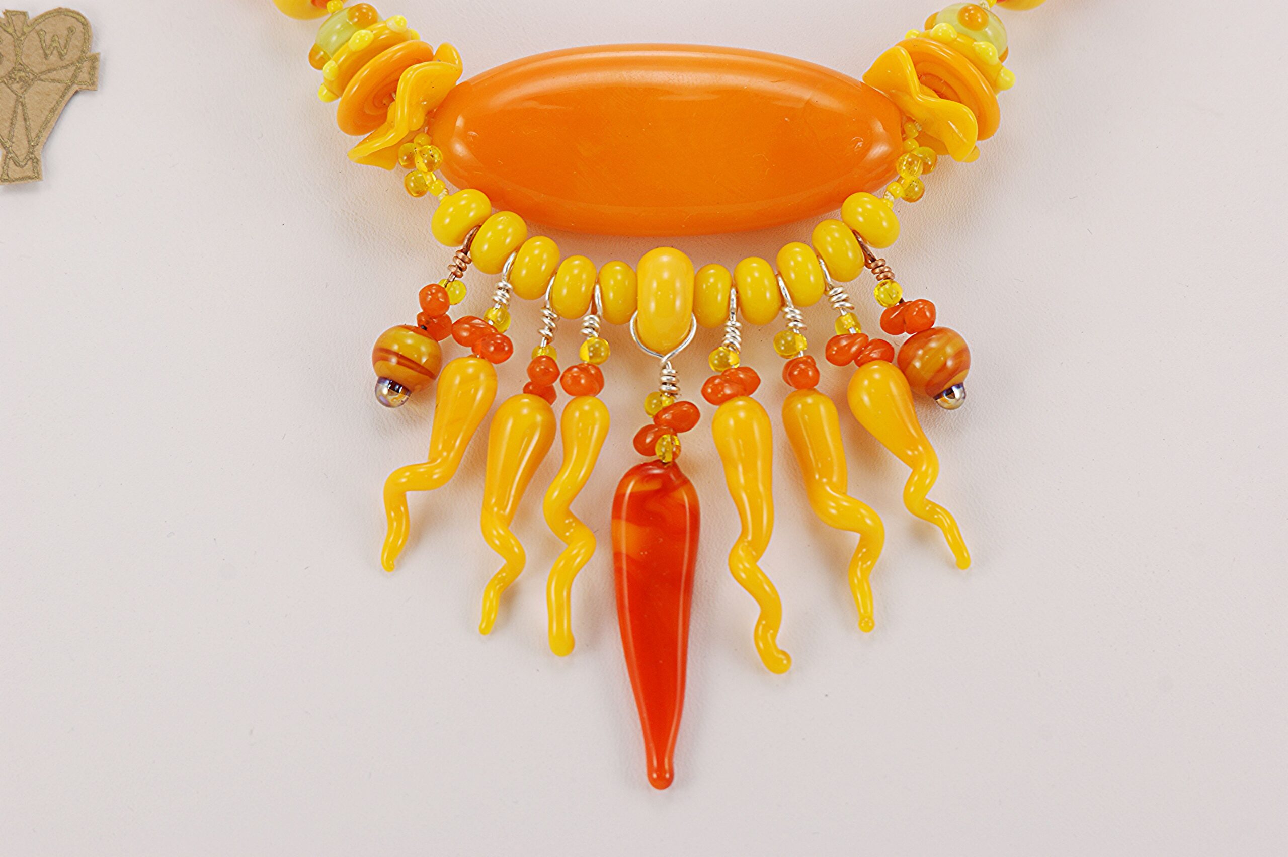 Necklace with yellow orange glass beads.
