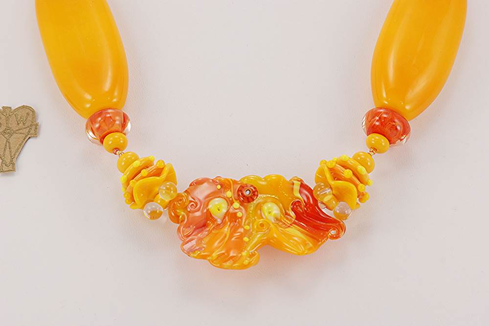 necklace with bright orange yellow glass beads