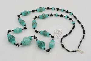 Kryptonite foam green colored glass bead necklace.