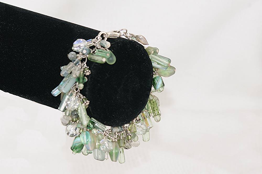 Handmade jade and moss agate bracelet on sterling silver chain.