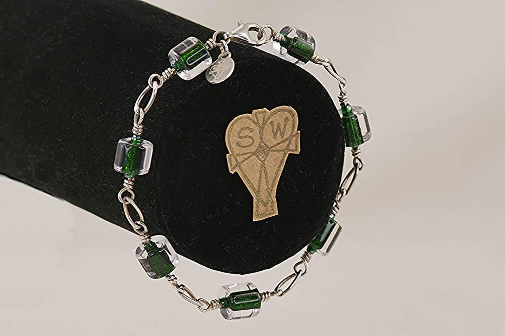 Emerald green quartz glass bead bracelet with sterling silver .