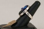 Unique, sterling silver and multi colored dichroic glass ring.
