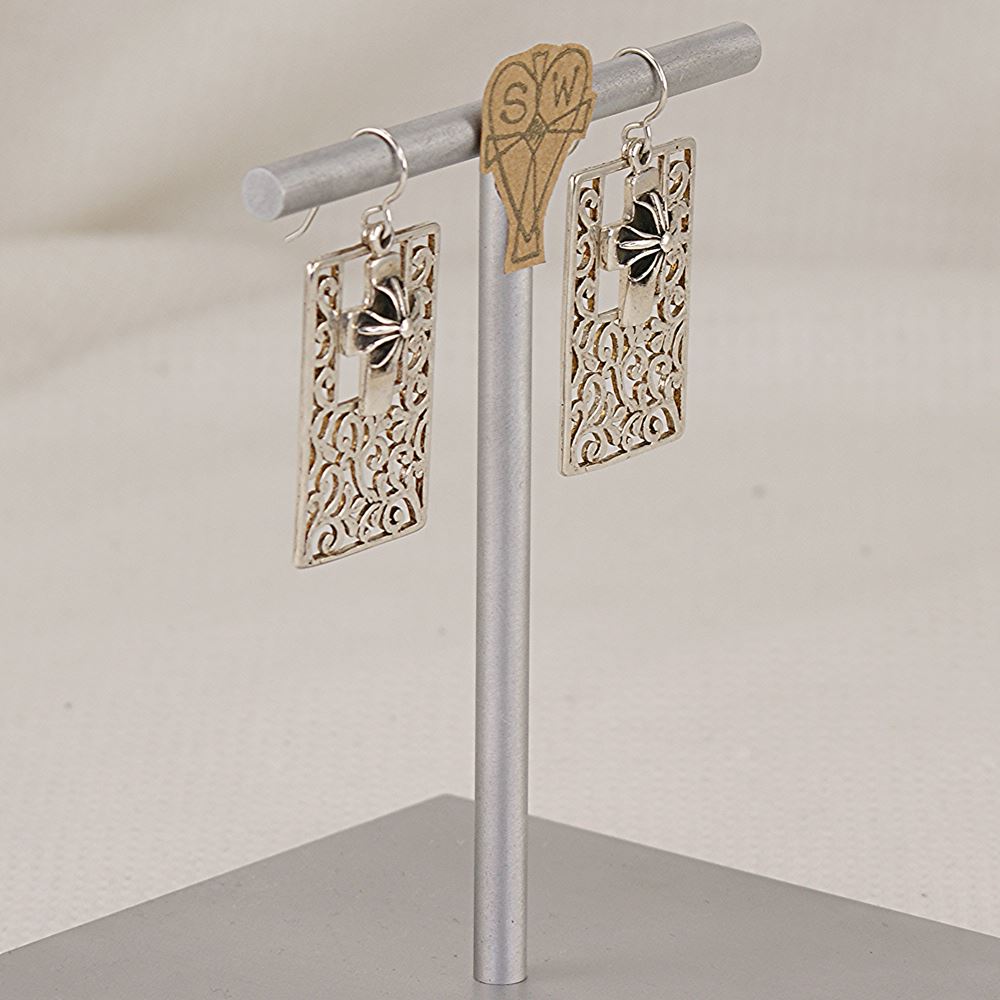 Handmade sterling silver flat scroll cut earrings with 3 dimensional crosses.