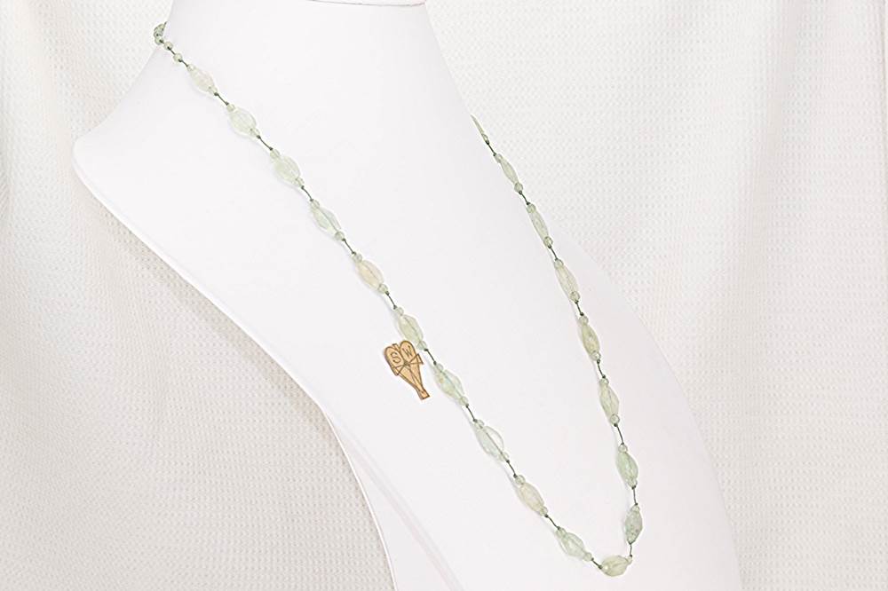 Green, faceted, moss agate necklace.