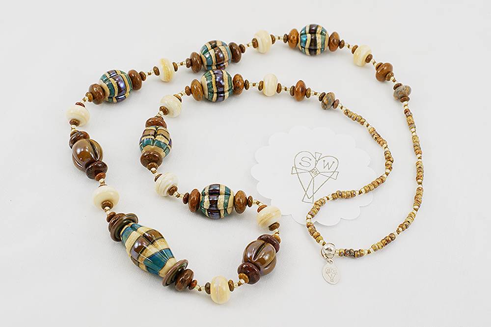 Necklace with chestnut, ivory and teal color glass beads.