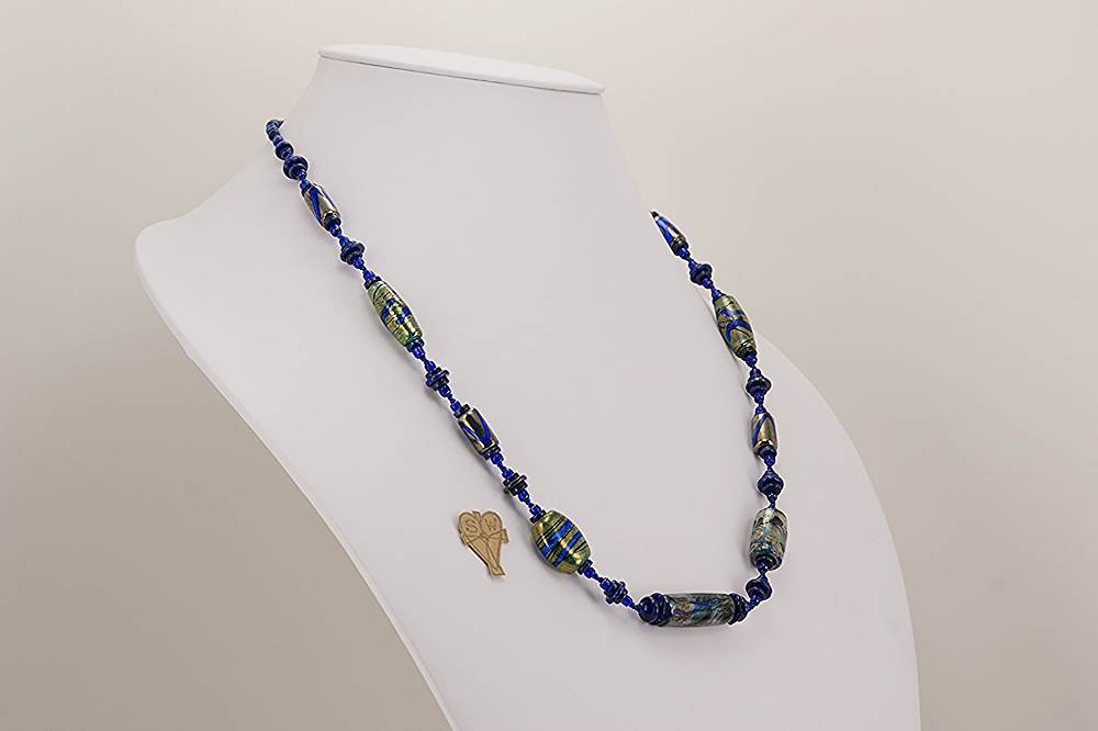 Handmade cobalt blue and sterling silver glass bead necklace.