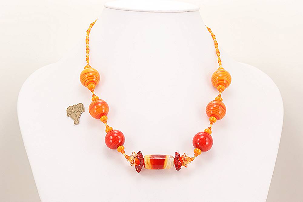 Bright orange and yellow glass bead necklace.