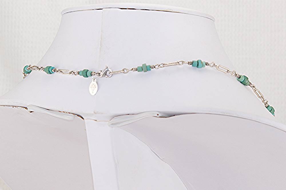 Necklace with natural turquoise beads on sterling silver open box chain.
