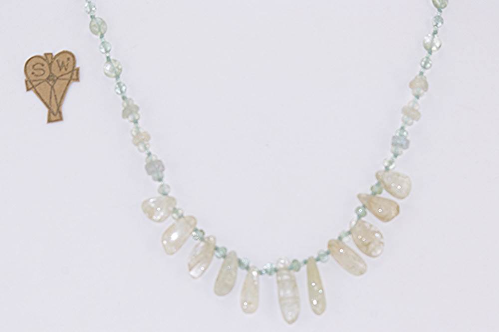 Handmade faceted moss agate necklace with rutilated quartz.