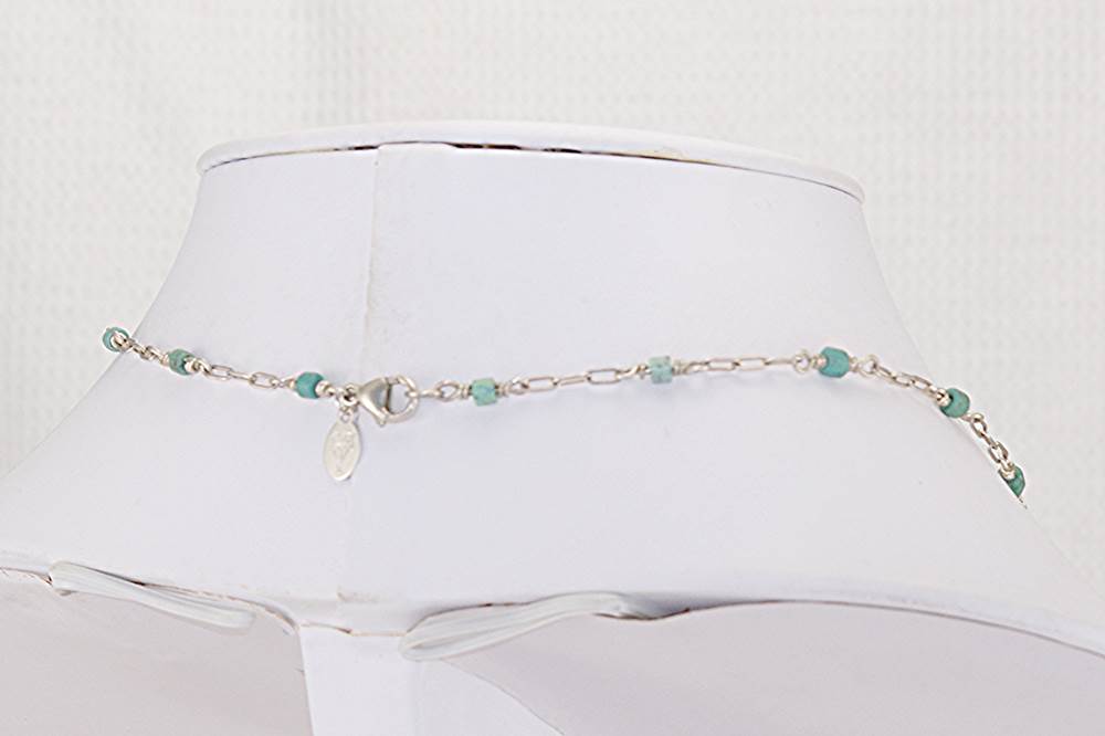 One of a kind necklace made of natural turquoise beads and sterling silver open box chain.