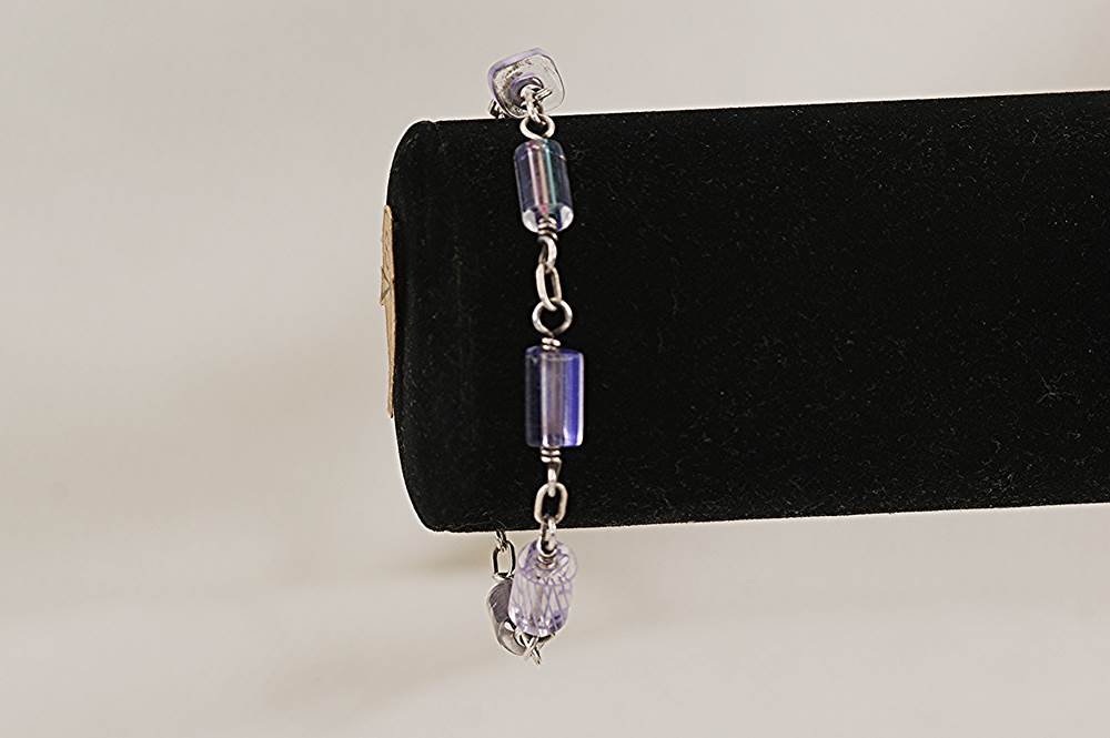 One of a kind, handmade, lavender, glass bead bracelet with sterling silver.