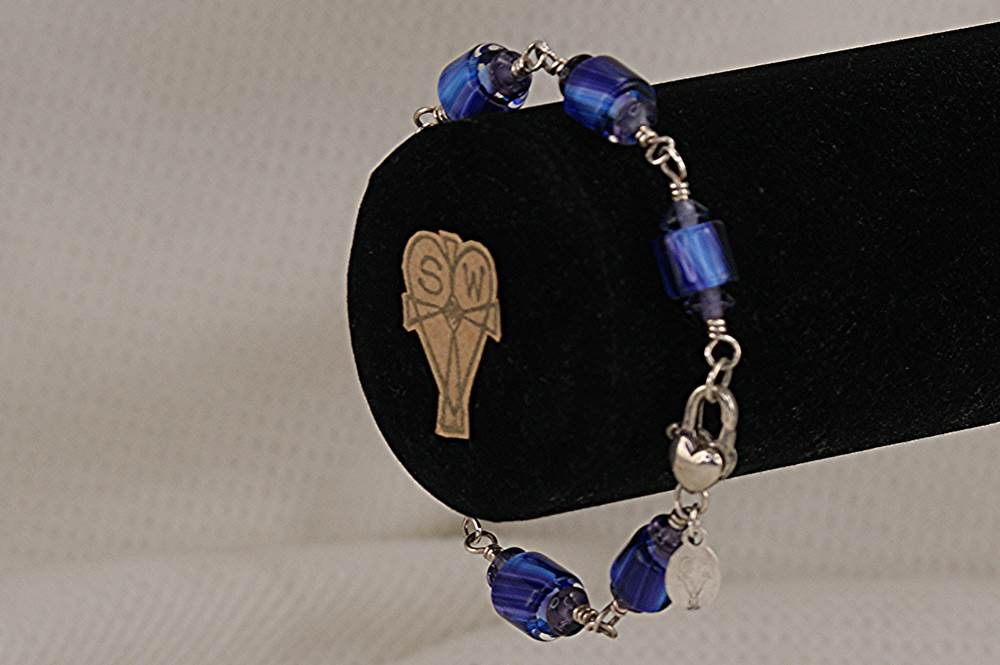 Sky blue glass and amethyst beaded bracelet with sterling silver.