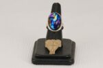 Multi colored dichroic glass and sterling silver ring.
