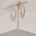 Earrings handmade of flat scroll cut sterling silver.