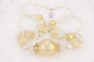 One of a kind necklace made of blown quartz glass with 18kt gold leaf and gold lined seed beads.