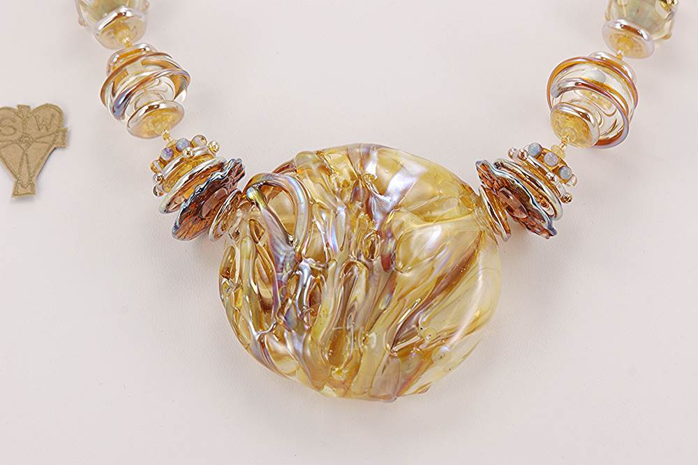 necklace with golden glass sterling silver accented hollow beads