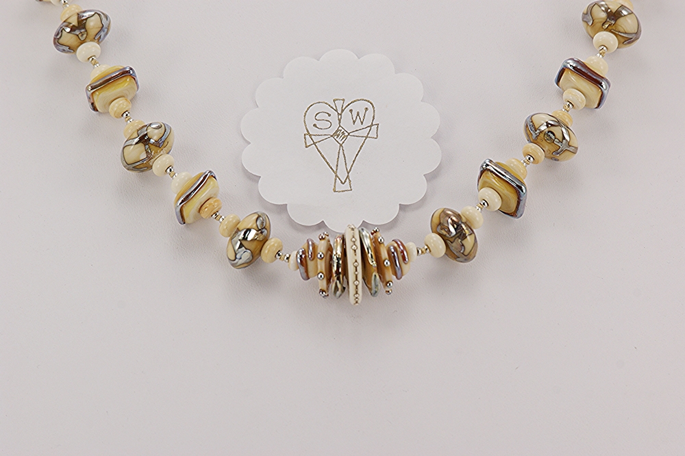 ivory color necklace with sterling silver accents