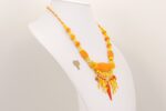 Necklace with vibrant yellow and orange glass beads