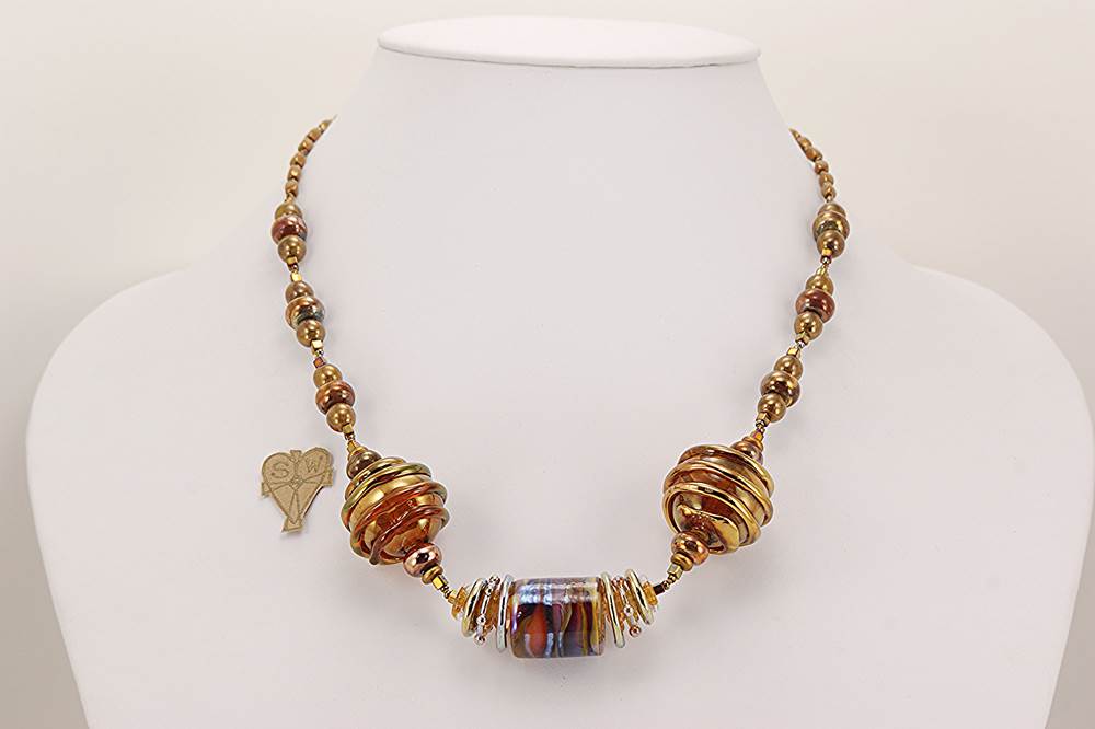 necklace made with copper bronze and silver colored glass beads