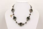 grey metallic glass bead necklace with sterling silver accents and raku effects