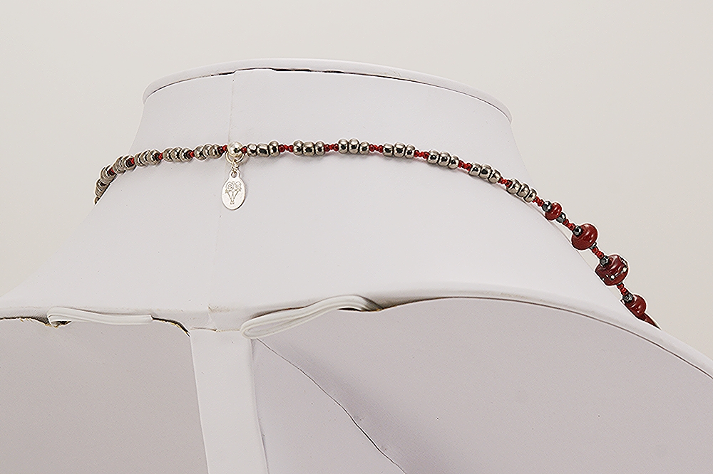 Red, black and grey beaded necklace.