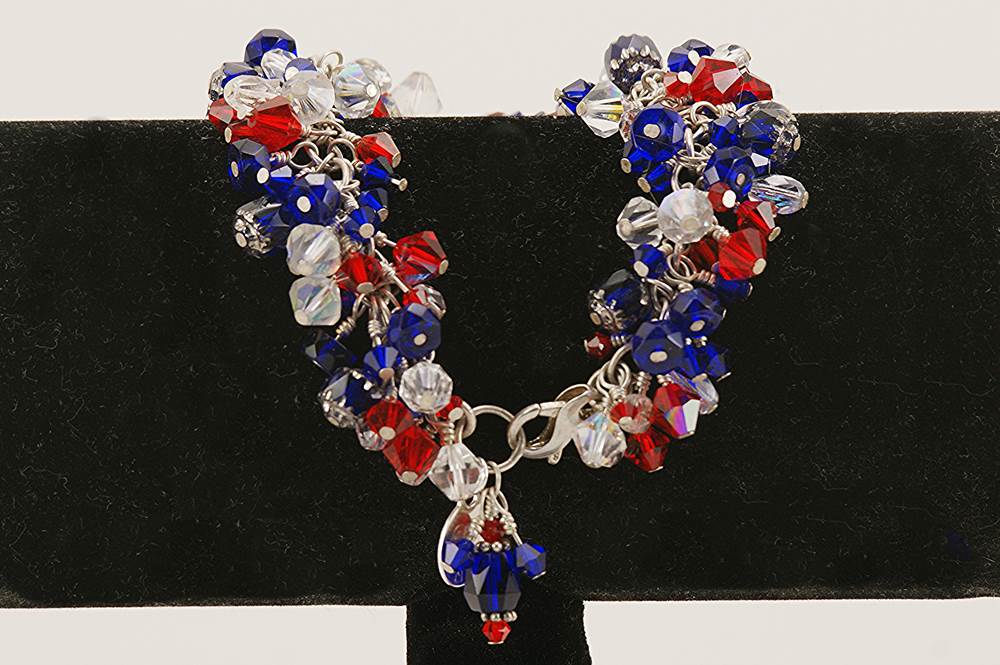 Unique, red, white and blue Swarovski crystal bracelet with sterling silver chain.