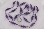 Handmade amethyst and quartz necklace.