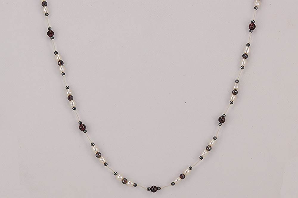 Raw ruby, freshwater pearl and hematite necklace.