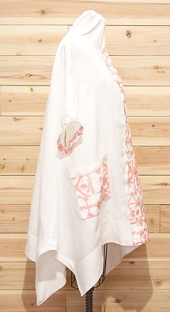 Chic cloak made of white, salmon and peach Japanese shibori linen, with 2 large front pockets.