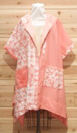 One of a kind, salmon and white chic cloak made of Japanese shibori linen with 2 large front pockets.