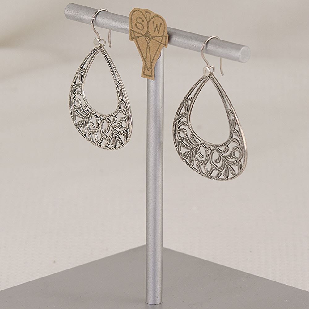 Handmade, scroll cut sterling silver earrings.