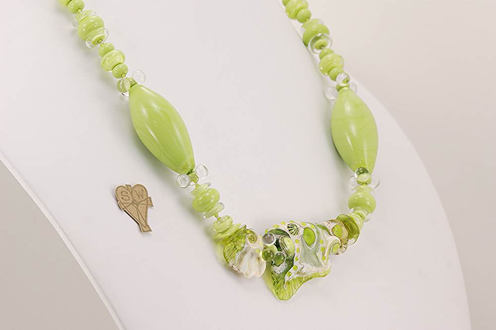 necklace with lime green and ivory colored gold dusted glass beads