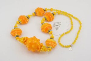 Bright yellow and orange glass beaded necklace.