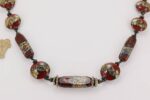Deep red, grey and black colored glass bead necklace.
