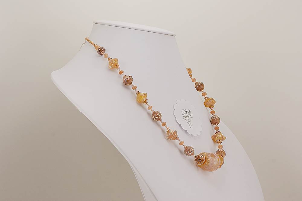necklace made of rose quartz and blush opalescent glass beads