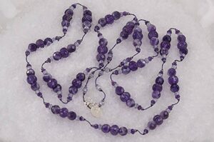 Handmade amethyst and quartz necklace.