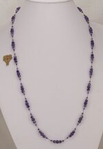 33 inch long, amethyst and quartz necklace.
