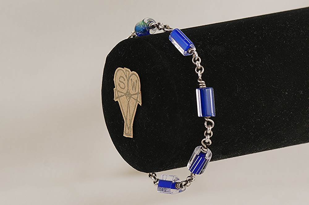 Royal blue and clear quartz crystal beaded bracelet with sterling silver.