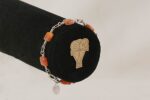 Handmade, orange sunstone and sterling silver bracelet.